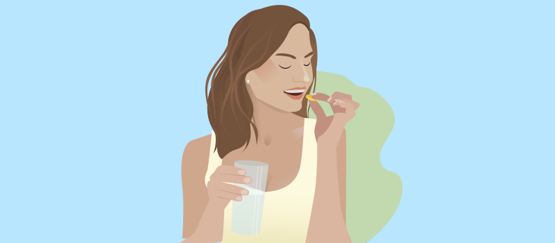 cartoon woman taking a supplement