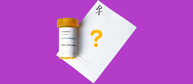 prescription with pill bottle on purple background