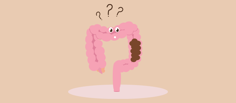 cartoon colon with face and question marks around it